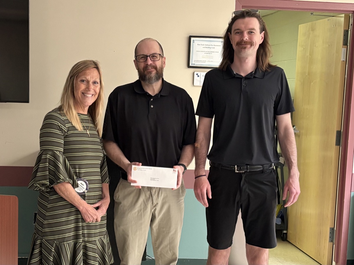 Club members presenting donation to the Clifton Springs YMCA